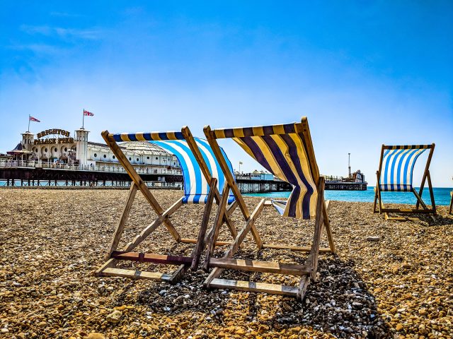 Two deckchairs on Brighton beach